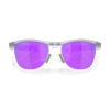 عینک آفتابی اوکلی Frogskins Hybrid – لنز Prizm Violet فریم Matte Trans Lilac Clear